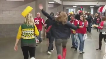 Annoying Falcons Fan Is Running Around And Trolling Packers Fans By Knocking Off Their Cheesehead Hats At Stadium