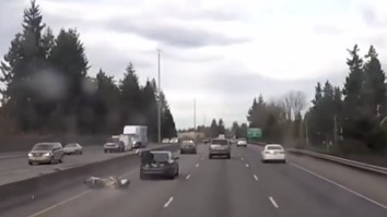 Motorcycle Crashes Into Car On The Highway, Dude Lands On The Car’s Trunk And Rides Away Like A Boss
