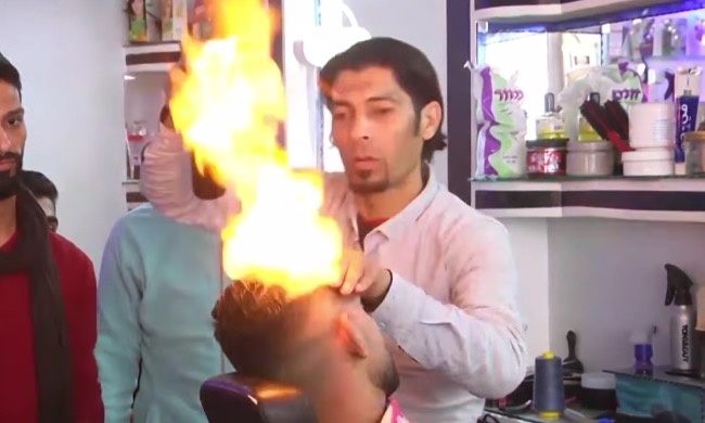 Barber uses Blowtorch