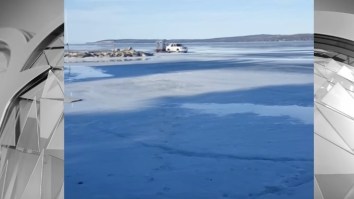 Man Captures The Instant When A Cadillac Escalade Falls Through Thin Ice On Lake Michigan And Gets Stuck