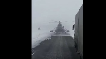 Military Helicopter Blocks Trucker And Lands In The Middle Of The Road For Something That We’ve All Had To Do