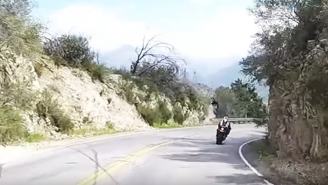 WATCH: Guy Lucky To Be Alive As Motorcycle Flies Off Cliff