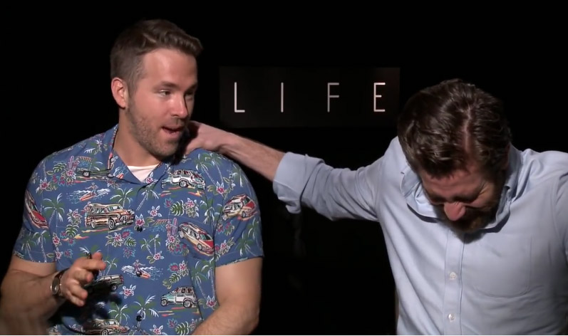 Watch Jake Gyllenhaal and Ryan Reynolds completely lose it during