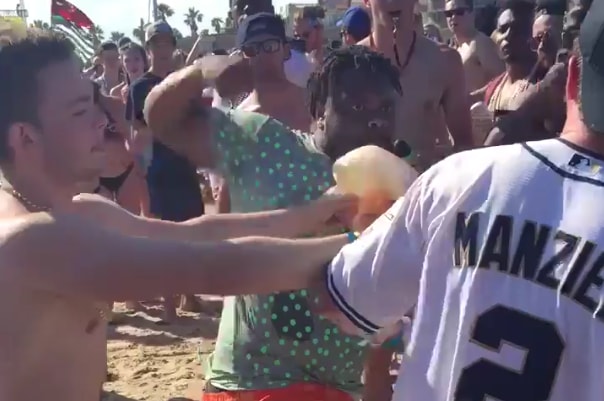 Spring Break Chaos: Buddy Was Laying Dudes Out Left And Right On The Beach!