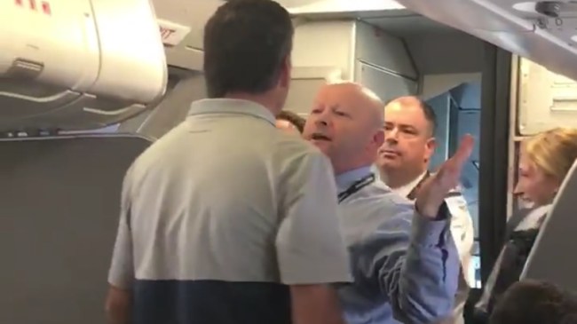 american airlines woman hit attendant fight