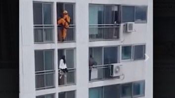 Hero Firefighter Rescues Suicidal Girl From Jumping Off A Balcony With A Double-Legged Kick