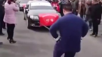 Dare You To Watch This Guy Pull 7 Cars Weighing Almost 14 Tons With His Nuts And Not Cringe