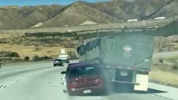 Oblivious Semi-Truck Driver Dragging A Helpless Car Over 4 Miles Is Some ‘Mad Max’ Ish