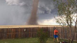 Internet Thinks Photo Of This Man Mowing His Lawn With A Tornado Looming Is Fake… It’s Not