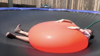 Dude Gets Legitimately Crushed By A 6ft Water Balloon, Pops It In Slow-Mo Before His Legs Break