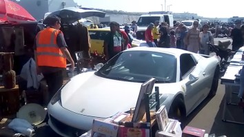 Jerk In A Ferrari Ignores ‘No Parking’ Sign, Is Pissed To Find His Car Surrounded By Antiques Fair