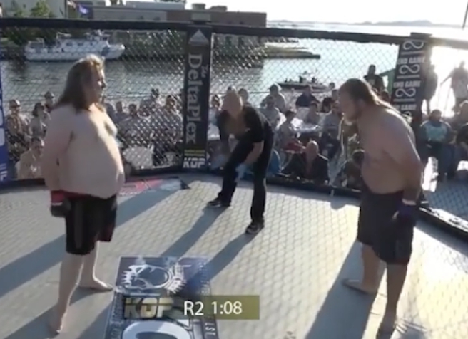 Heavyweight MMA Fight Ends After Dude Blows Chunks All Over The Mat
