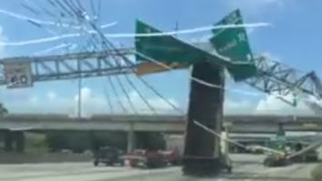 Watch A Dump Truck Flip After Colliding With A Sign Because It Was Driving With The Bed Up