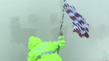 Texas Police Officer Battles Hurricane Harvey To Save An American Flag