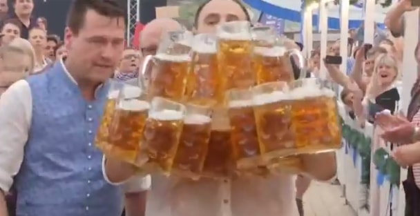 A German Man Just Broke A World Record By Carrying 29 Beer Steins