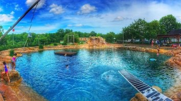 This Guy Built A Giant 500,000 Gallon Pool In His Backyard That’s Basically A Pond
