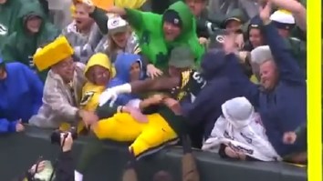 Female Packers Fan Gets A Little Too Handsy With Aaron Jones During Lambeau Leap
