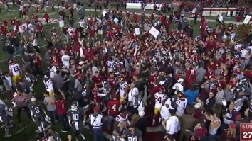 USC Player Lays Out Unsuspecting Washington State Fan Rushing The Field