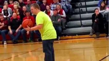 High Schooler With Down Syndrome Drills A No-Look Half Court Shot At Halftime, Crowd Goes Bananas