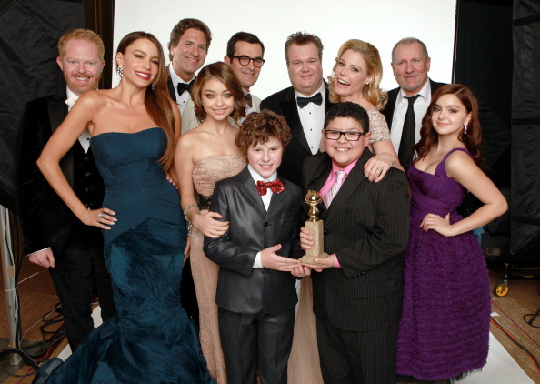 Actors Jesse Tyler Ferguson, Sofia Vergara, creator/producer Steven Levitan, actors Sarah Hyland, Ty Burrell, Nolan Gould, Eric Stonestreet, Julie Bowen, Rico Rodriguez, Ed O'Neill and Ariel Winter, winners of the Best Television Series - Musical or Comedy award for "Modern Family" pose for a portrait backstage at the 69th Annual Golden Globe Awards