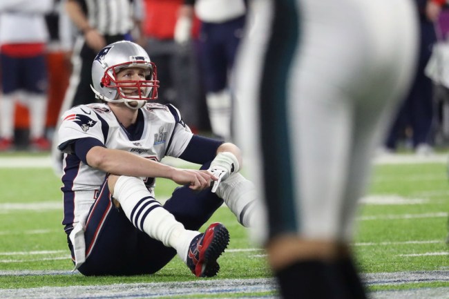 MINNEAPOLIS, MN - FEBRUARY 04: Tom Brady #12 of the New England Patriots reacts after fumbling the ball during the fourth quarter against the Philadelphia Eagles in Super Bowl LII at U.S. Bank Stadium on February 4, 2018 in Minneapolis, Minnesota. The Philadelphia Eagles defeated the New England Patriots 41-33.