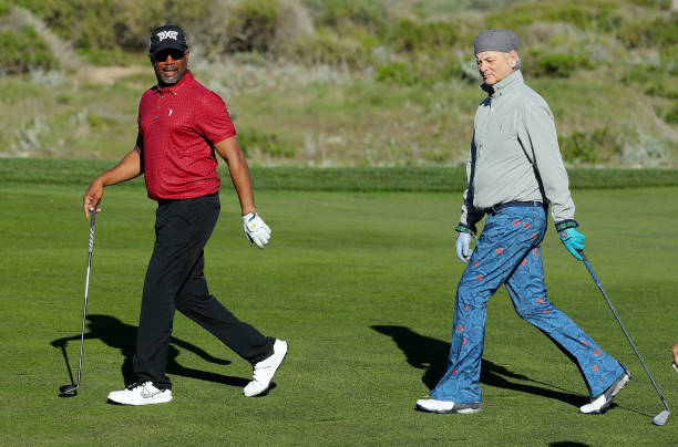 Darius Rucker (L) and Bill Murray walk across the 13th hole during Round Two of the AT&T Pebble Beach Pro-Am at Monterey Peninsula Country Club in Pebble Beach, California. 