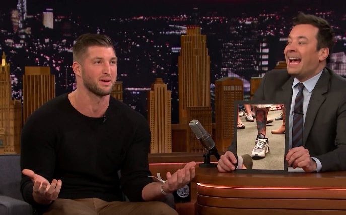Tim Tebow Reviews Really Bad Fan Tattoos Of His Face - BroBible