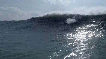 Footage Shows How Dangerous Big Wave Surfing Can Be When Surfer And Rescuer Get Rocked By Waves