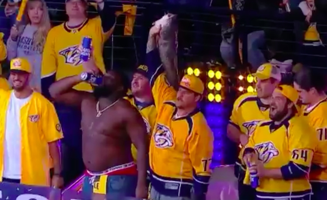 Titans' Taylor Lewan goes berserk, chugs beers and gets shirtless at  Predators game