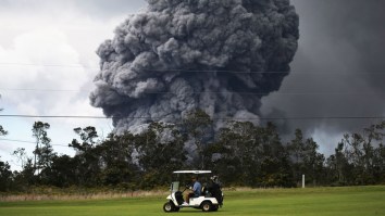 Check Out These Bros Getting In A Little Golf While A Freaking Volcano Erupts In The Distance