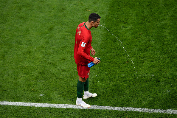 SARANSK, RUSSIA - JUNE 25:  Cristiano Ronaldo of Portugal spits water during the 2018 FIFA World Cup Russia group B match between Iran and Portugal at Mordovia Arena on June 25, 2018 in Saransk, Russia.  (Photo by Hector Vivas/Getty Images)