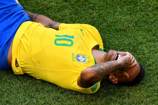 neymar lying on ground foul