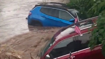 Torrential Rain Resulted In A Literal River Of Cars Pouring Out Of A Jeep Dealership In New Jersey