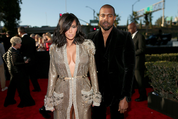TV personality Kim Kardashian (L) and recording artist Kanye West attend The 57th Annual GRAMMY Awards at the STAPLES Center on February 8, 2015 in Los Angeles, California.  (Photo by Christopher Polk/WireImage)