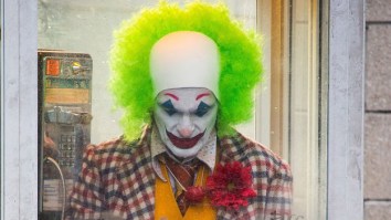 Joaquin Phoenix’s Joker Runs All Over Gotham, Flips Over A Cab, As Police Give Chase In New Set Video