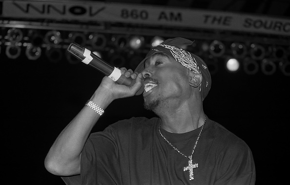 MILWAUKEE - SEPTEMBER 1994:  Rapper Tupac Shakur performs at the Mecca Arena in Milwaukee, Wisconsin in September 1994.  (Photo By Raymond Boyd/Getty Images)