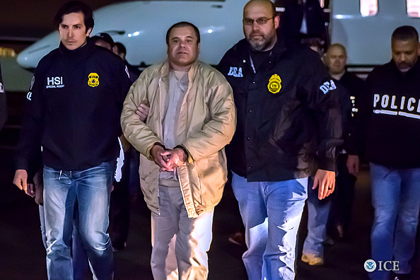 NEW YORK, NY - JANUARY 19, 2017: In this handout provided by U.S. Immigration and Customs Enforcement, Federal authorities announced Friday that Joaquin Archivaldo Guzman Loera, known by various aliases including, âEl Chapo,â? will face charges filed in Brooklyn, New York, following his extradition to the United States from Mexico. Guzman Loera arrived in New York under heavy escort by special agents with U.S. Immigration and Customs Enforcement  (ICE) Homeland Security Investigations and the Drug Enforcement Administration (DEA) and other authorities. (Photo by Charles Reed/U.S. Immigration and Customs Enforcement via Getty Images)