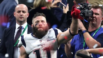 Watch A Fan Try (And Fail) To Sneak Into The Patriots’ Locker Room Wearing A Stolen Security Coat