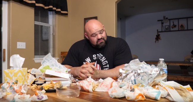 world's strongest man in the world brian shaw eats the entire Taco Bell menu