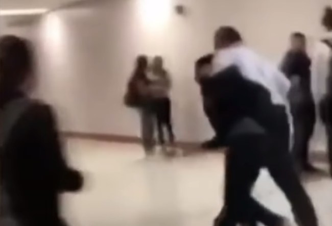 student attempts RKO wrestling move on high school principal gets arrested