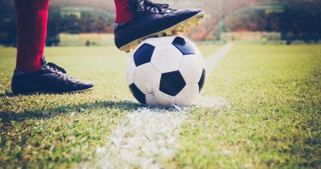 Soccer ball and cleats
