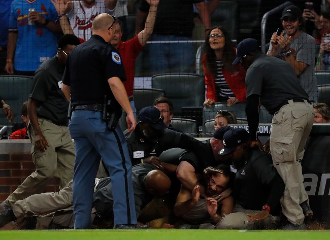 Fan Gets Crushed By Security After Running On Field At Braves Game