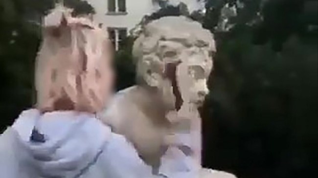 Julia Slonska, an Instagram model from Poland, tried to go viral by destroying a historic statue in Warsaw and got slammed instead.