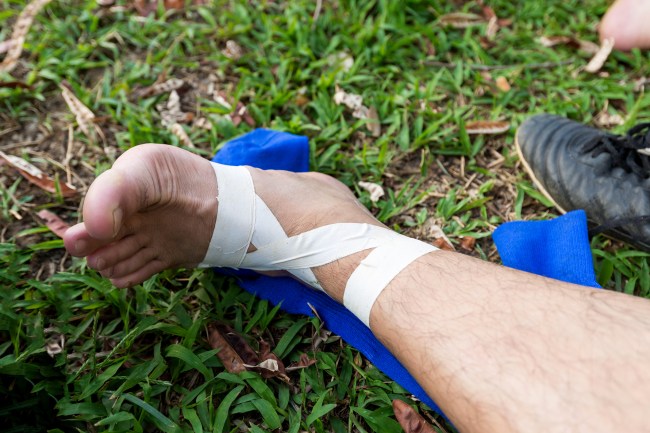shin kicking soccer cleats ankle bandage injury