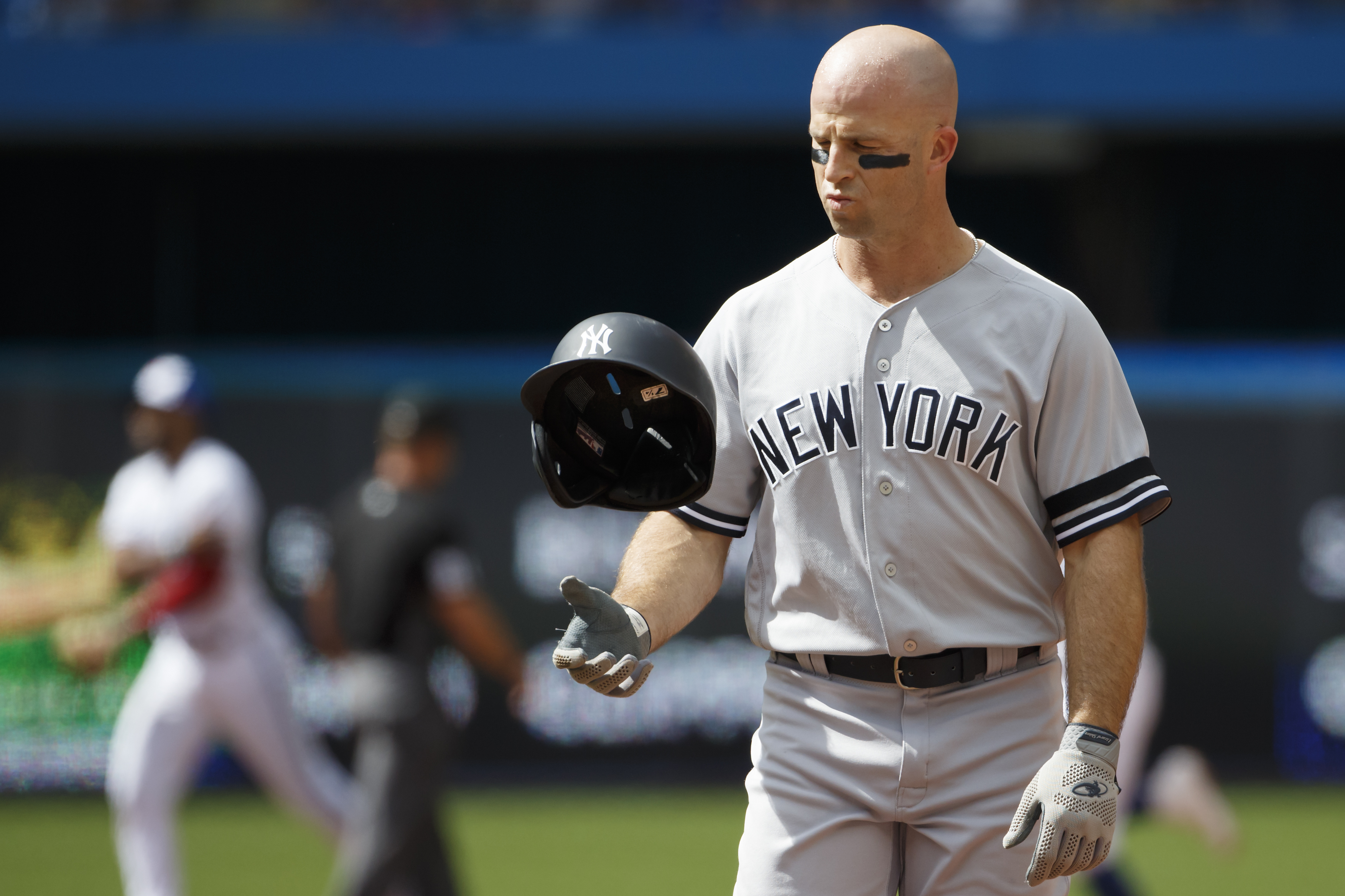 Photo shows Brett Gardner's bat banging doing damage to Yankees dugout