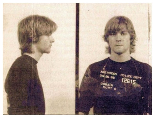 Dave Grohl, Kurt Cobain and Krist Novoselic. Story behind Kurt Cobain arrest and mug shot from spray painting.