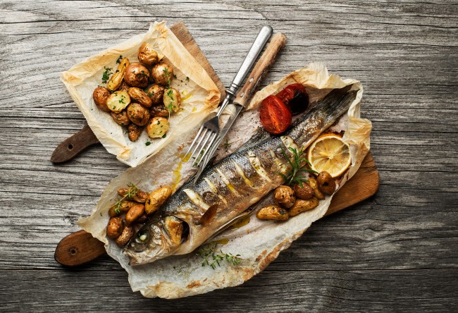 baked sea bass fish and potatoes
