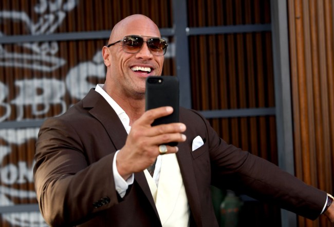 Dwayne "The Rock" Johnson revealed what's in his gym bag when he goes to workout -- hot dogs, tequila and a doll. 