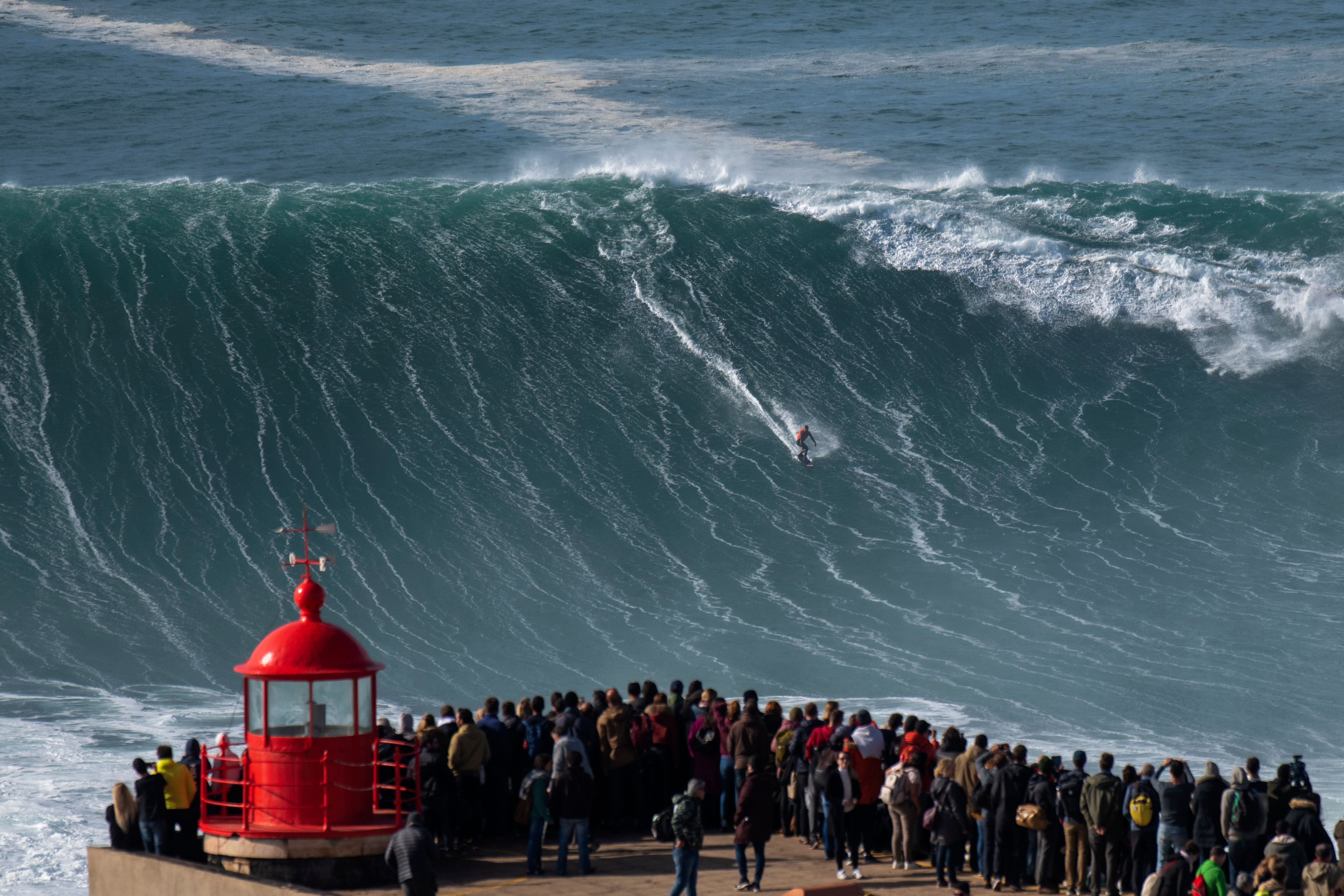 Surfer Barely Escapes Getting Swallowed By A Mountain-Sized Wave