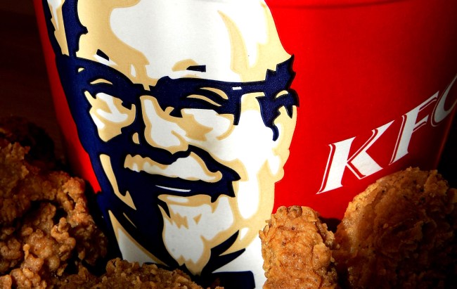 Guy Eats A Bucket Of KFC Chicken While Watching Vegan Protestors
